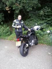 Pete (Playback) with his bike and a brew at Ladybower.